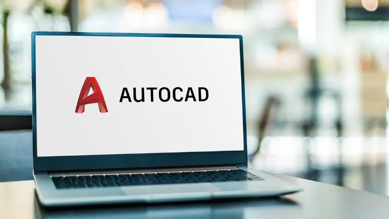 Màn hình máy tính hiển thị biểu tượng bảo mật, nhấn mạnh việc tải AutoCAD từ nguồn chính thức để tránh rủi ro