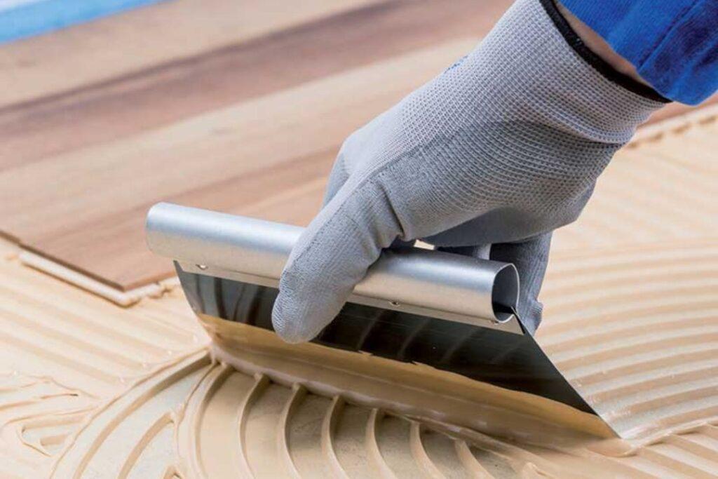 Cận cảnh cấu trúc sợi vải địa kỹ thuật không dệt dạng hóa dính với các điểm liên kết hóa học đặc trưng